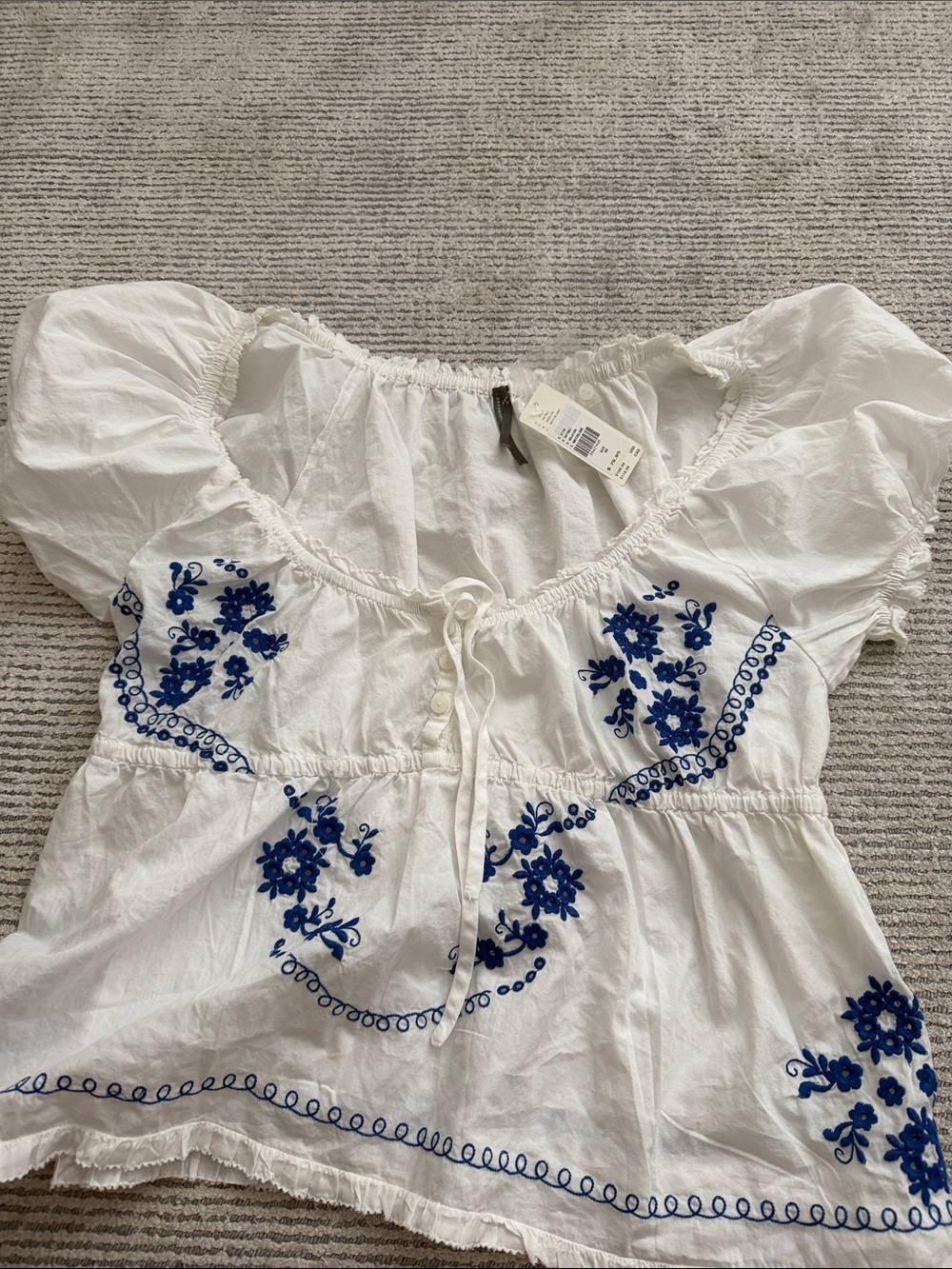 Anthropologie White Peasant Peplum Top with Blue Embroidery size medium